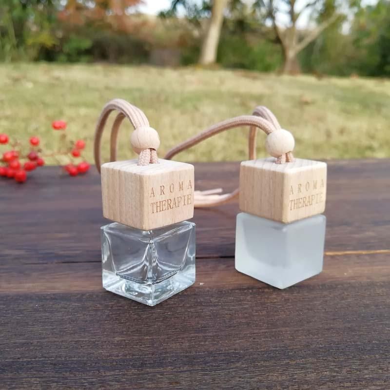 Wholesale 10ml Air Freshener Diffuser Empty Frosted Car Hanging Perfume Bottle with Wooden Cap